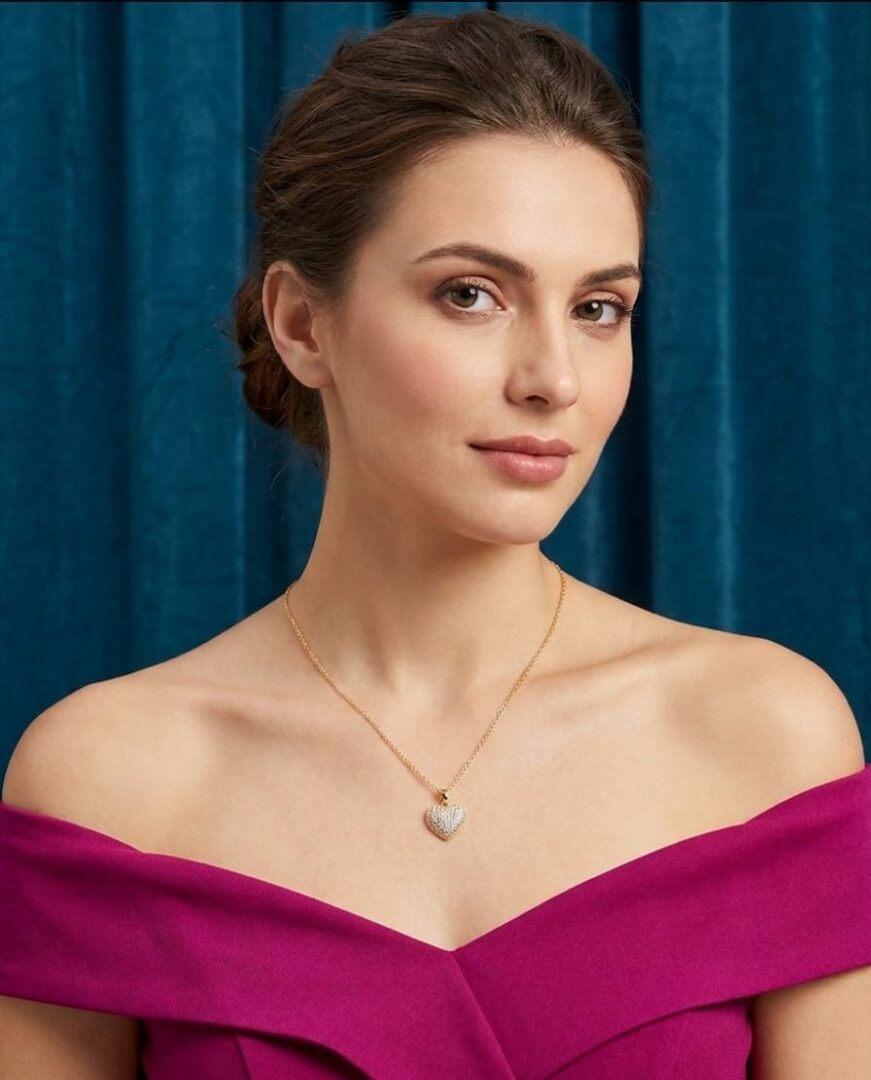 golden heart charm pandent from tedisha jewels