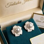 floral white studs earrings from tedisha Jewels